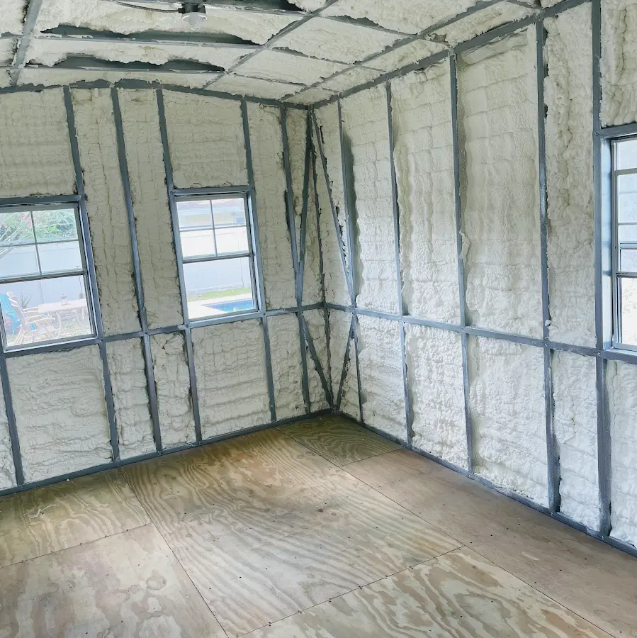 Closed-cell spray foam insulation applied to wall cavities in a residential project in Baton Rouge